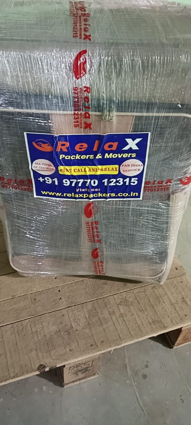 Sofa wrapped in protective packing